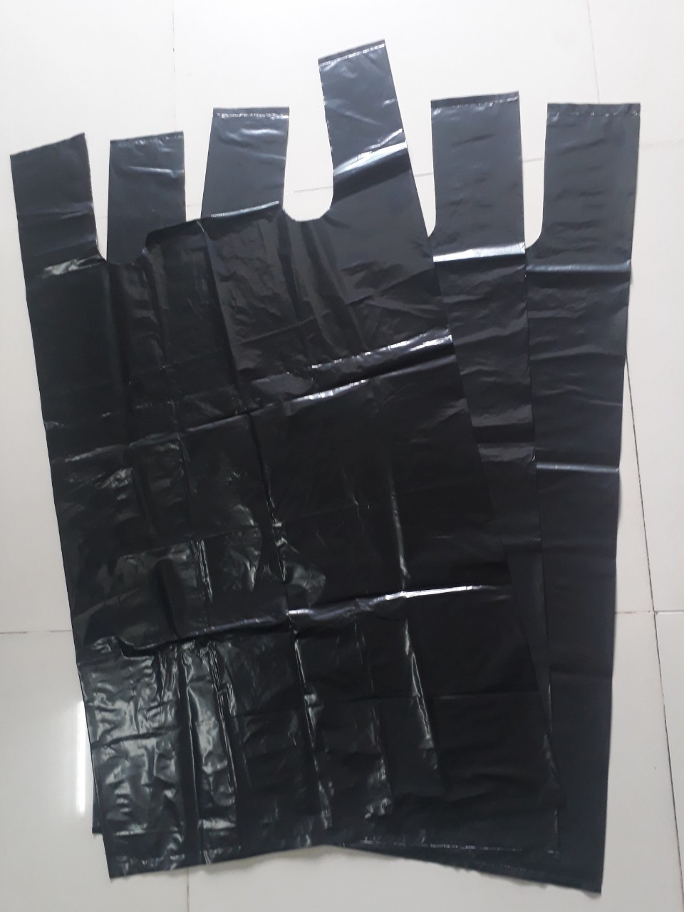 Túi màu đen - Túi Nilong Tân Hồng Phát - Công Ty TNHH Bao Bì Và Dịch Vụ Vận Tải Tân Hồng Phát